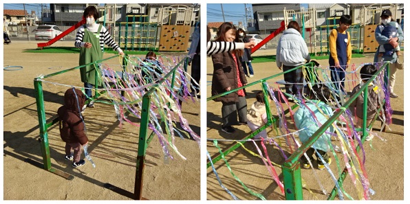ひらひらビニールテープの中をくぐる子どもたち